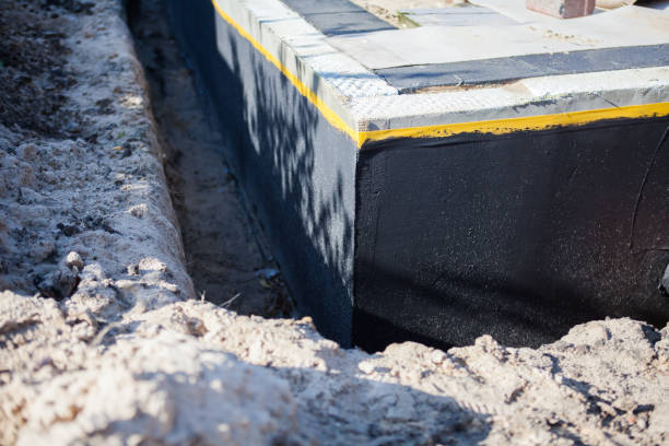 Professional Waterproofing technician working in Trenton, NJ